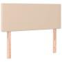 Boxspringbett Kopfteil in Cappuccino-Braun mit Holzfüßen.