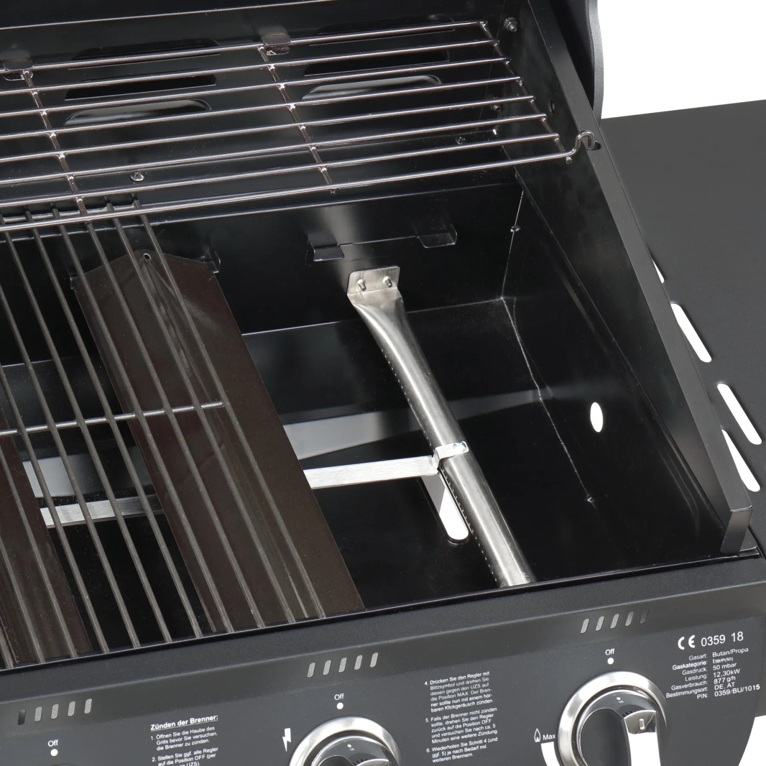 Detailaufnahme des El Fuego Gasgrills Columbus mit Grillrost, Warmhalterost und Edelstahlbrenner.