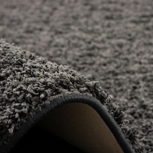 Detailaufnahme: Anthrazitfarbener Snapstyle Hochflor Teppich Milano (80x240cm), weicher Langflor.