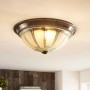 Dimmbare LED Deckenleuchte Henja in Bronze mit Glasschirm im Retro Vintage Design.
