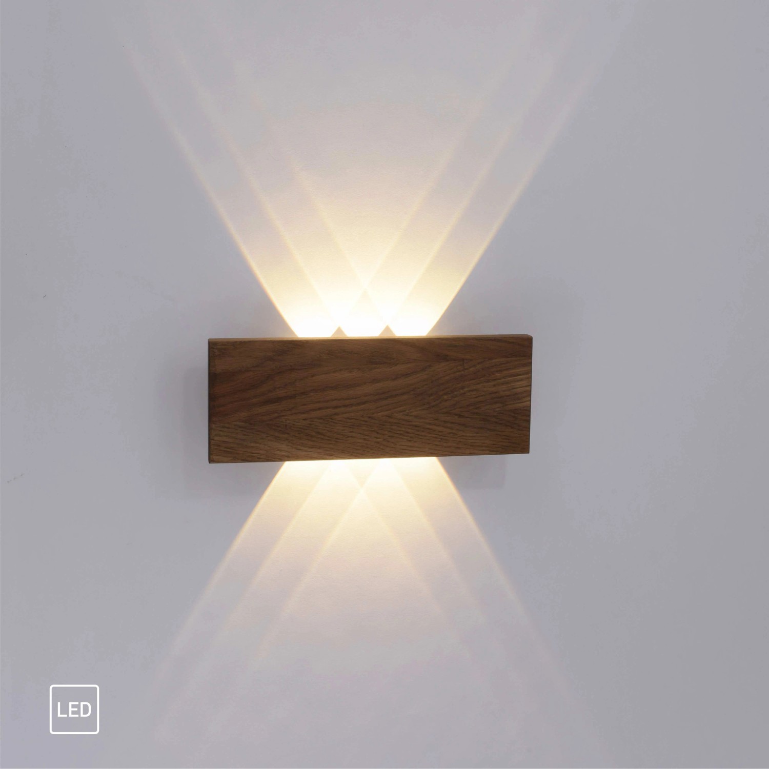 Rechteckige Paul Neuhaus LED-Wandlampe Palma mit Holzdekor, 32x12 cm, strahlt warmweißes Licht nach oben und unten.