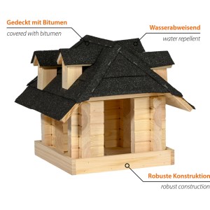 Dobar Vogelhaus Nero aus hellem Massivholz mit dunklem Bitumen-Walmdach und Gauben. Robuste Bauweise.