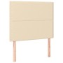 Cremefarbenes vidaXL Boxspringbett Kopfteil mit Stoffbezug und Holzfüßen.
