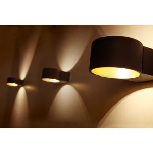 Trio LED-Wandleuchten Lacapo, schwarz-gold, mit Up & Down Beleuchtung.
