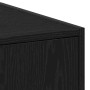 Detailaufnahme: Schwarzer Apothekerschrank in Eichen-Optik für Wohnzimmer.