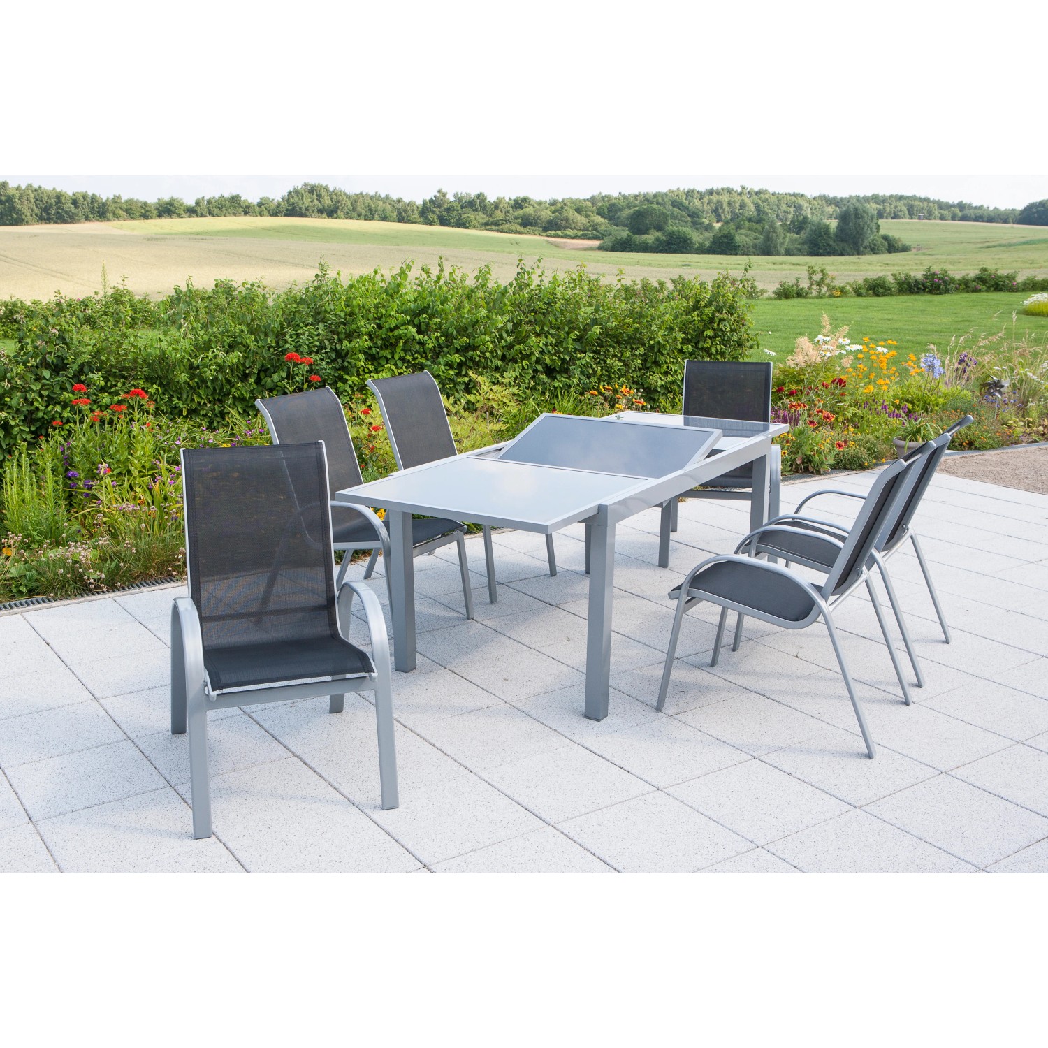 7-teiliges Gartenmöbel-Set Amalfi in Schwarz mit ausziehbarem Tisch (160/220x90 cm).