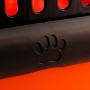 Detailaufnahme: Schwarzer Verschluss mit Pfotenabdruck an orangefarbener Heimtier-Transportbox.