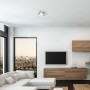 Moderne, silberne Brilo LED-Deckenleuchte Nici mit warmweißem Licht in Wohnraum.