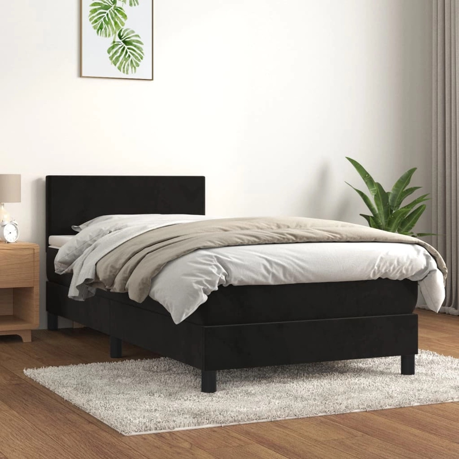 Schwarzes vidaXL Boxspringbett (90x200 cm) mit Matratze und Kopfteil aus Samt.
