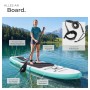 Tectake Stand Up Paddle Board Zenon, weiß-türkis, mit Frau auf See. Zeigt verstellbares Paddel, Spanngurt, Tragegriff, Fußschlaufe.