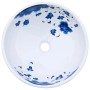Rundes Aufsatzwaschbecken in Weiß-Blau mit floralem Muster, Ø41 cm.