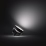 Schwarze Philips Hue Iris Tischleuchte mit Farbwechsel und 570 Lumen Lichtstärke.