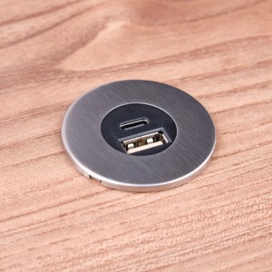 Runder kalb Einbau USB Hub aus gebürstetem Edelstahl mit USB-A und USB-C Anschluss in Holzplatte. Für Möbel.