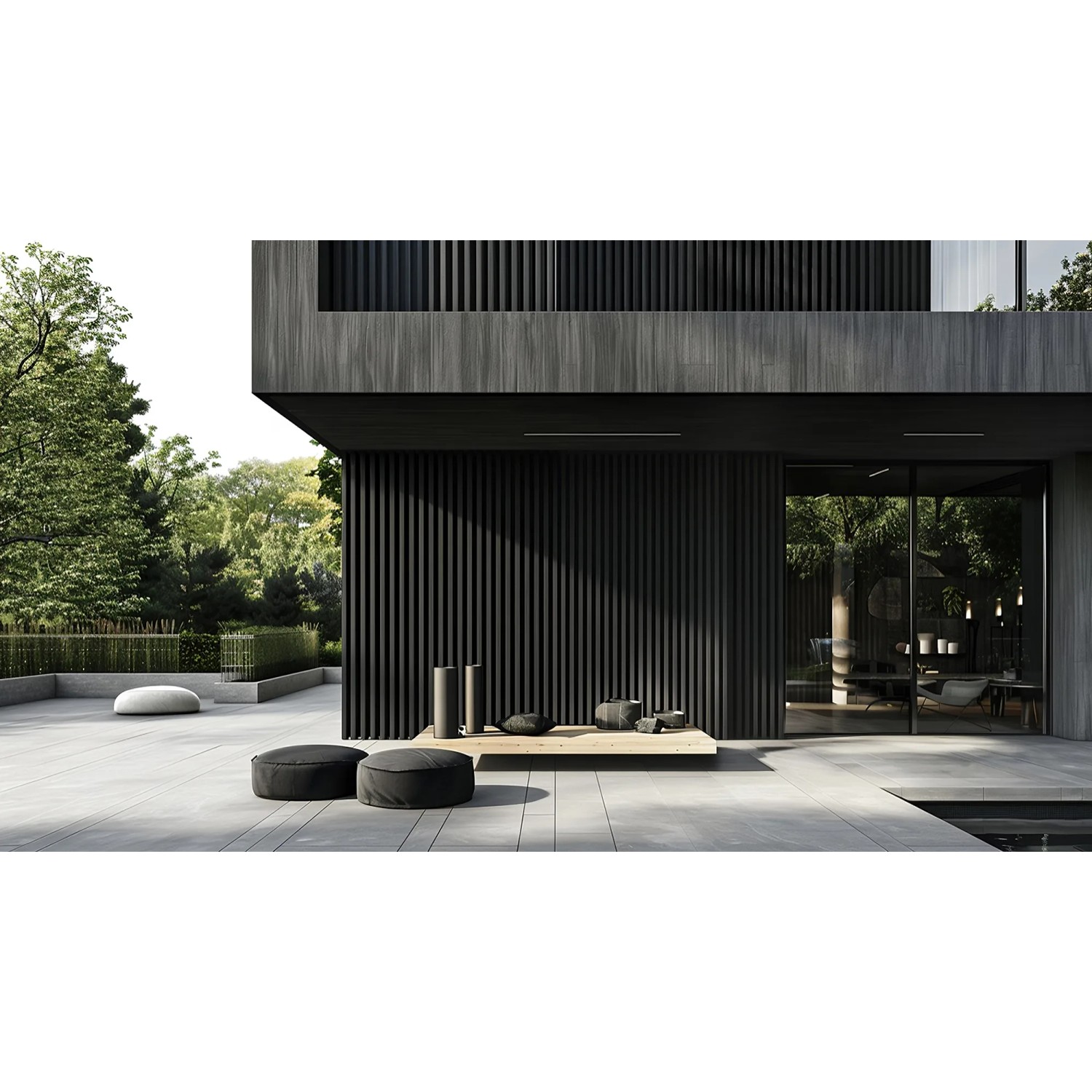 Moderne Hausfassade mit anthrazitfarbener WPC Fassadenverkleidung DUVAR im Außenbereich.