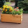 Holz Pflanzkasten Lucca mit bunten Blumen bepflanzt, für Terrasse und Balkon.