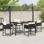 Schwarze 5-tlg. vidaXL Garten Essgruppe aus Poly Rattan mit Tisch und Stühlen mit Kissen.