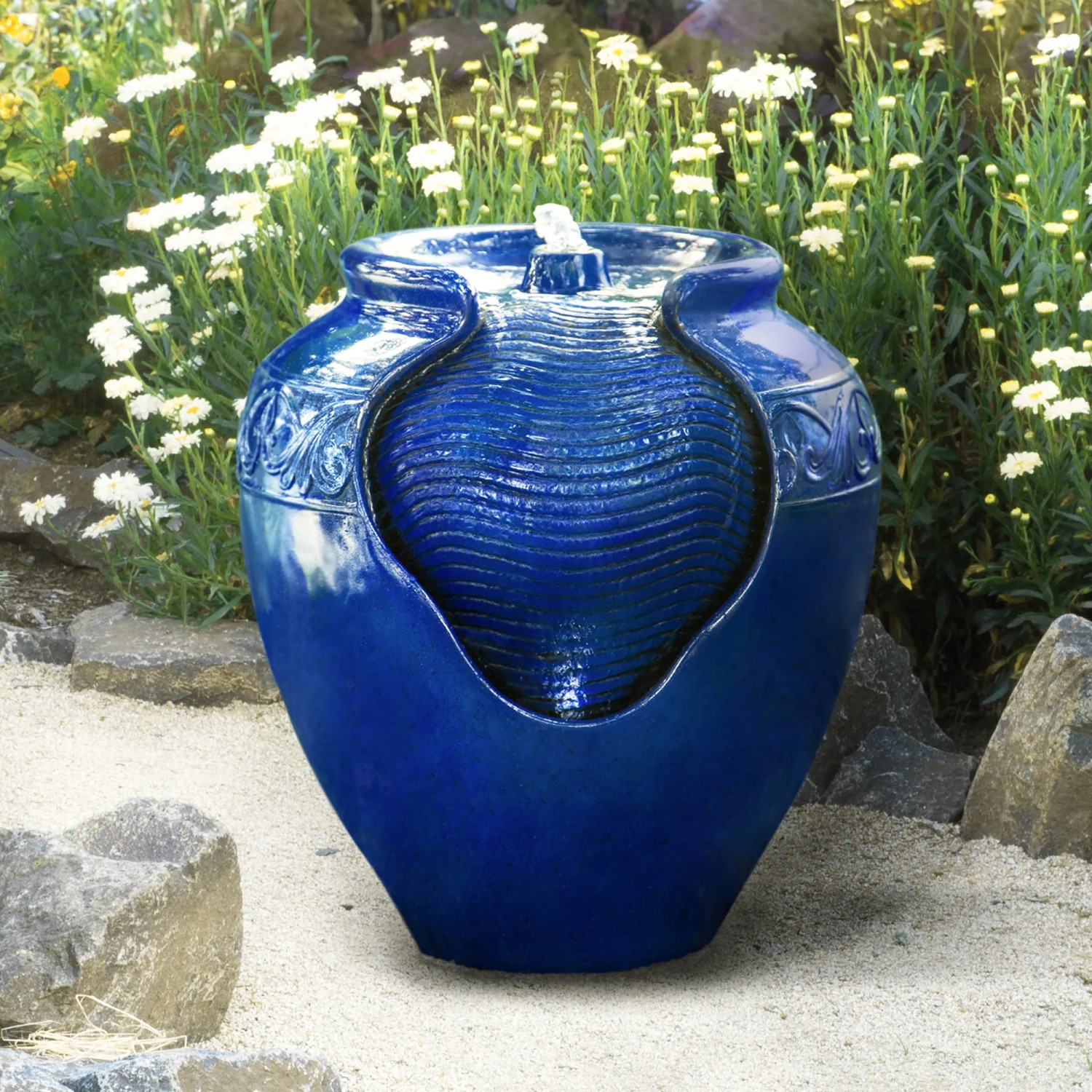 Blauer Teamson Home Gartenbrunnen in Topfform mit LED-Beleuchtung.