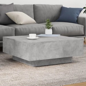 Quadratischer, grauer Couchtisch mit LED-Beleuchtung im Wohnzimmer.