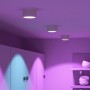 Drei weiße SSC-LUXon LED Aufbaustrahler CELI-X mit RGB CCT Beleuchtung an der Decke.