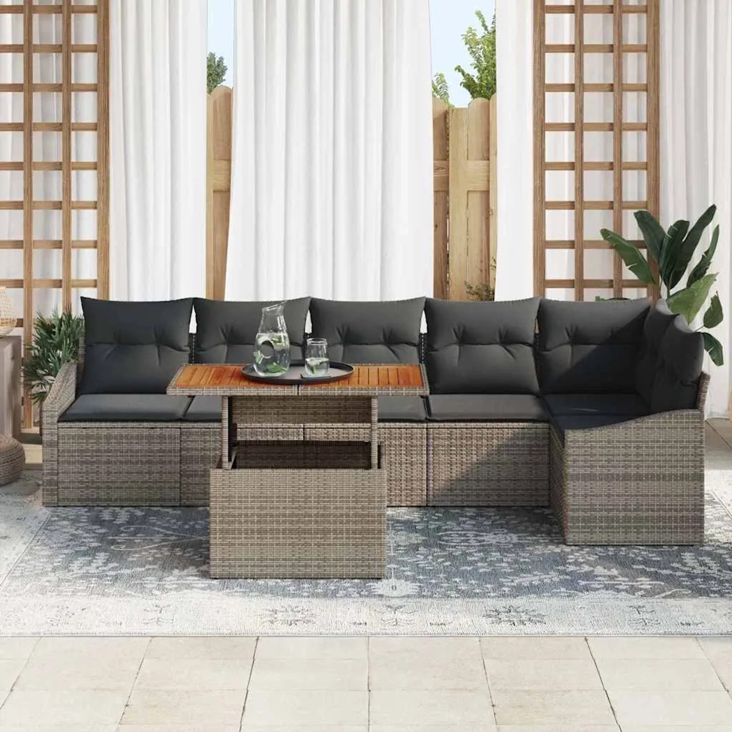Graues 7-teiliges vidaXL Garten-Sofa-Set aus Poly Rattan mit Tisch und Stauraum.