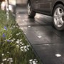 Philips LED-Einbauleuchte Moss aus Edelstahl im Gartenweg, warmweißes Licht.