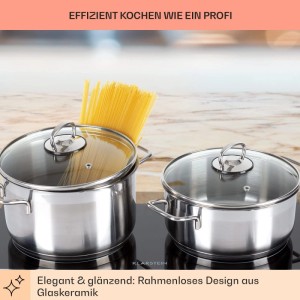 Klarstein Doppel-Kochfeld aus schwarzer Glaskeramik mit zwei silbernen Töpfen. Spaghetti kochen auf dem Elektrogerät.