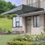 Graue Juskys Gelenkarmmarkise 300x250 cm am Haus montiert. Sonnenschutz für Terrasse und Balkon.