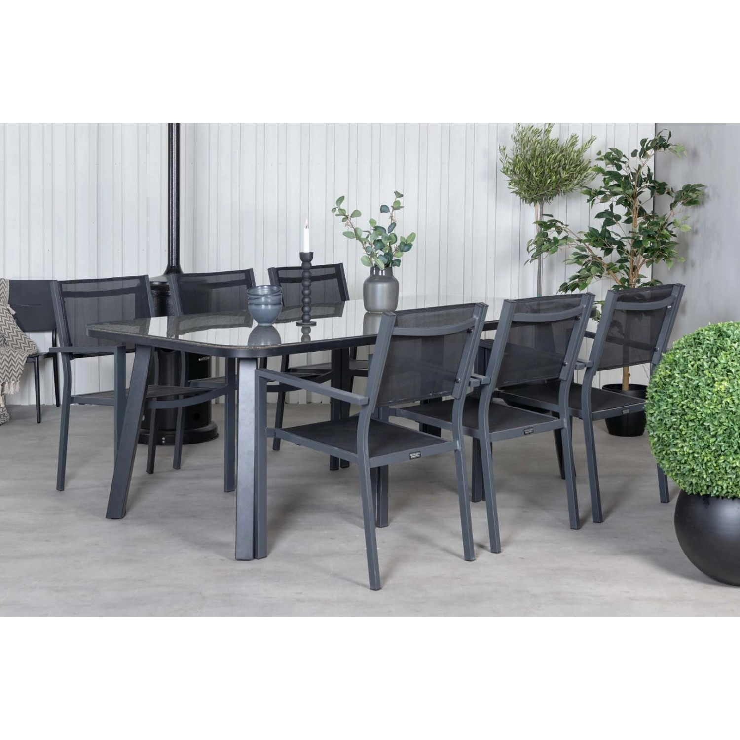 Schwarzes ebuy24 Paola Gartenset mit Tisch und 6 Copacabana Stühlen.