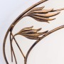 Detailaufnahme der Deckenleuchte Fleur Antik mit floralem, antik-goldenem Metallgestell.