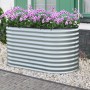Silbernes Floraworld Hochbeet Welle, 160x80x82 cm, bepflanzt mit lila Blumen.