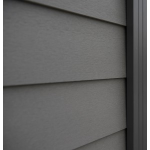 Detailaufnahme: Anthrazitfarbener WPC-Steckzaun Skär mit Schwedenprofil.