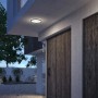 Schwarze Philips LED-Außendeckenleuchte mit SceneSwitch, 15W, an Hauswand.