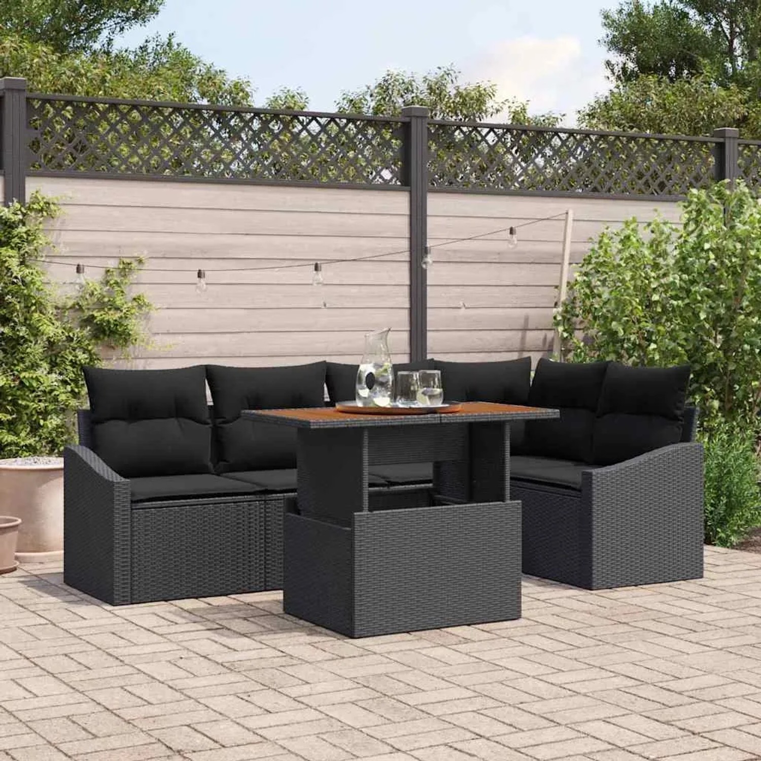 Schwarzes 6-tlg. vidaXL Garten-Sofa-Set mit Tisch und Stauraum aus Poly Rattan.