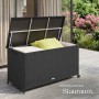 Geöffnete Tectake Auflagenbox Kuusamo (253 L) aus Polyrattan mit Rollen und Kissen im Garten.
