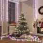 Dichte, pastell-mehrfarbige LED-Lichterkette (3000 LEDs, 23m) schmückt festlich einen Weihnachtsbaum und Raum.