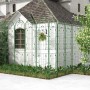Grünes Metall Rankgitter Set als Gartenzaun mit dekorativen Bögen und Blättern. Robuste Rankhilfe für Kletterpflanzen im Garten.
