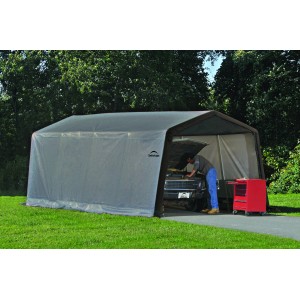 Graue ShelterLogic Garage (18,3 m²) mit Auto und Werkzeugwagen. Fertiggarage für Fahrzeuge.