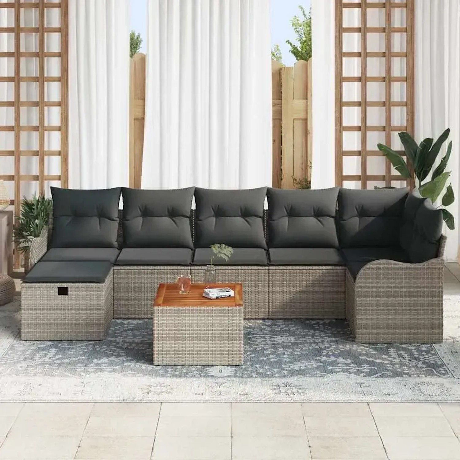 Graues 8-teiliges vidaXL Garten-Sofa-Set aus Polyrattan mit Kissen und Stauraum.
