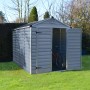 Palram Canopia Skylight Gerätehaus 1.9x3 in Anthrazit mit geöffneten Türen und Fahrrad im Inneren.