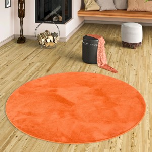 Runder, orangefarbener Hochflor Teppich Melia, 120x120cm, super soft und luxuriös.