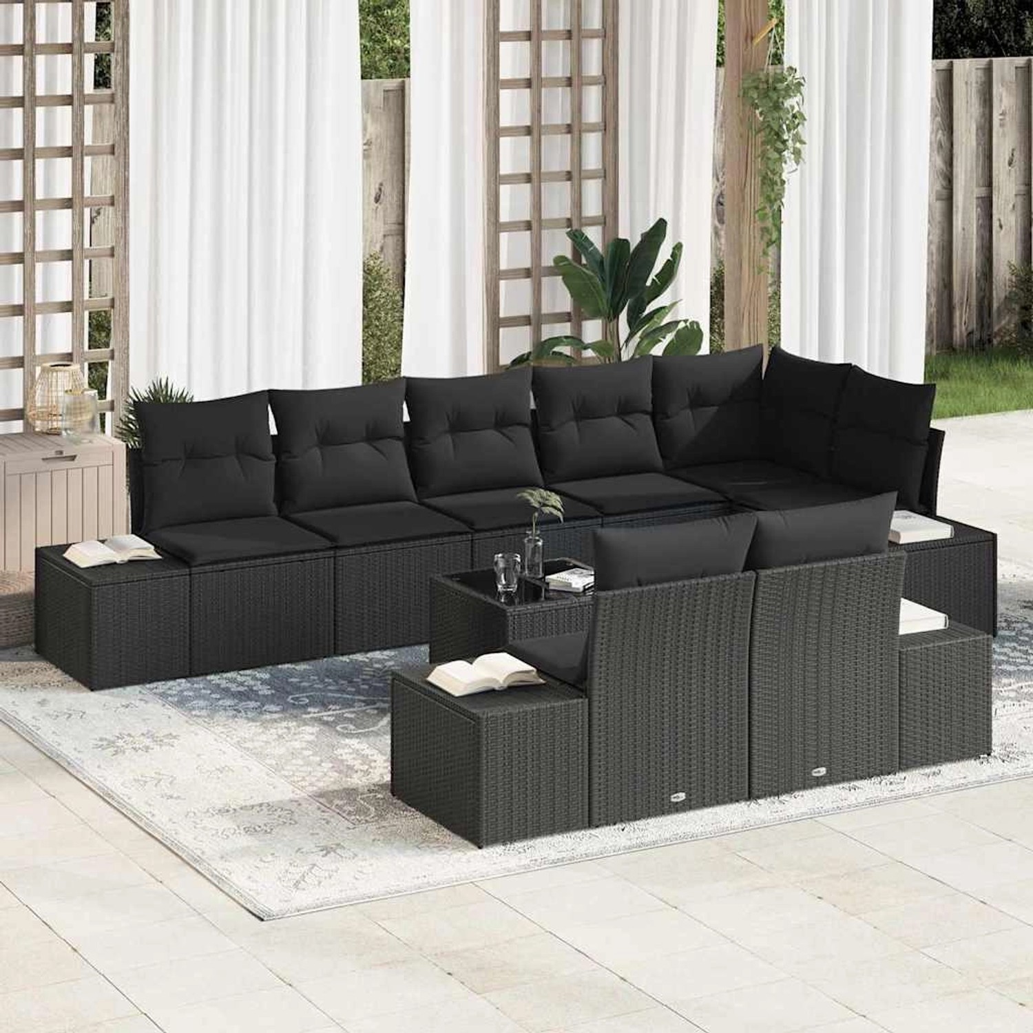 Schwarzes 9-teiliges vidaXL Garten-Sofa-Set aus Poly Rattan mit Kissen und Tisch.