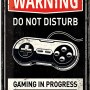 Nostalgic-Art Blechschild "Gaming in Process" (20x30 cm) mit Controller-Motiv.