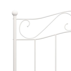 Detailansicht: Weißes Metall Bettgestell 90x200 cm mit geschwungenem Design.