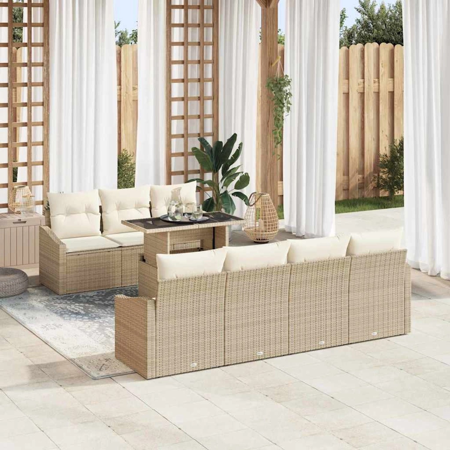 8-teiliges Garten-Sofa-Set aus Poly Rattan in Beige mit Tisch und Kissen.