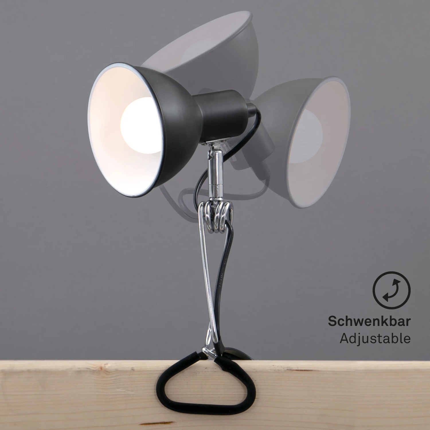 Schwenkbare Briloner Klemmleuchte Fix in Schwarz-Chrom, ideal als Leselicht.