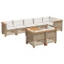 Beige 9-teilige Garten-Sofagarnitur aus Poly Rattan mit cremeweißen Kissen und Akazienholztisch.