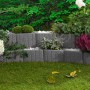 Graue Kann Pflanzsteine Mini Plus als dekorative, bepflanzte Gartenmauer.