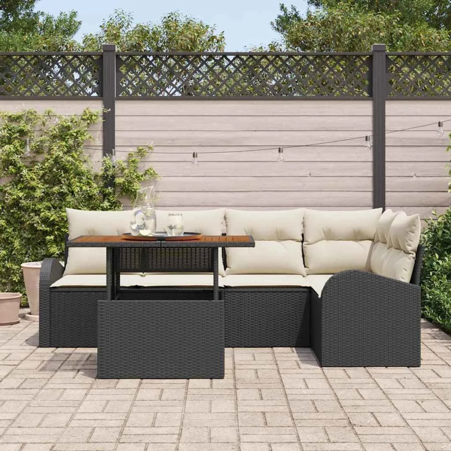 Schwarzes 6-tlg. vidaXL Garten-Sofa-Set aus Poly Rattan mit Tisch und Stauraum.