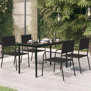 Schwarzer vidaXL Garten-Esstisch (140x70 cm) aus Stahl und Glas mit vier Stühlen im Garten.