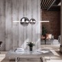 Moderne LED-Pendelleuchte Nova Chrome mit Rauchglaskugeln im Wohnraum.
